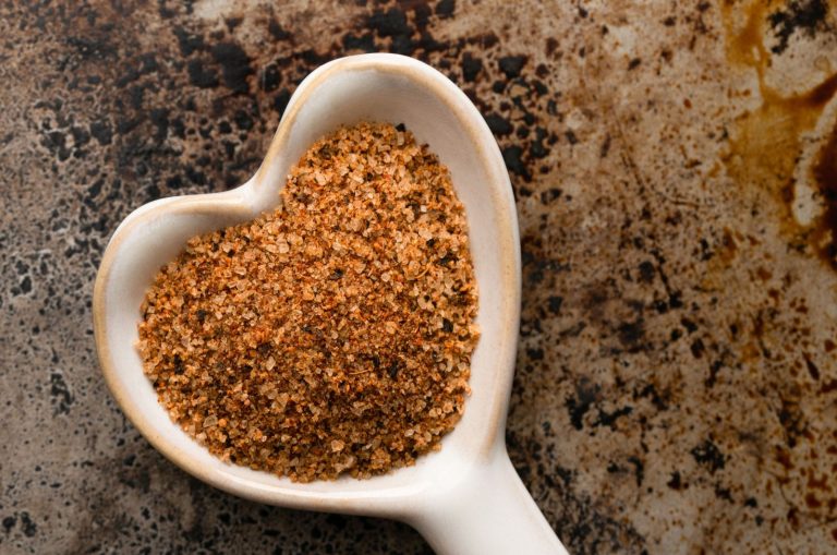 cajun seasoning in a heart shaped spoon