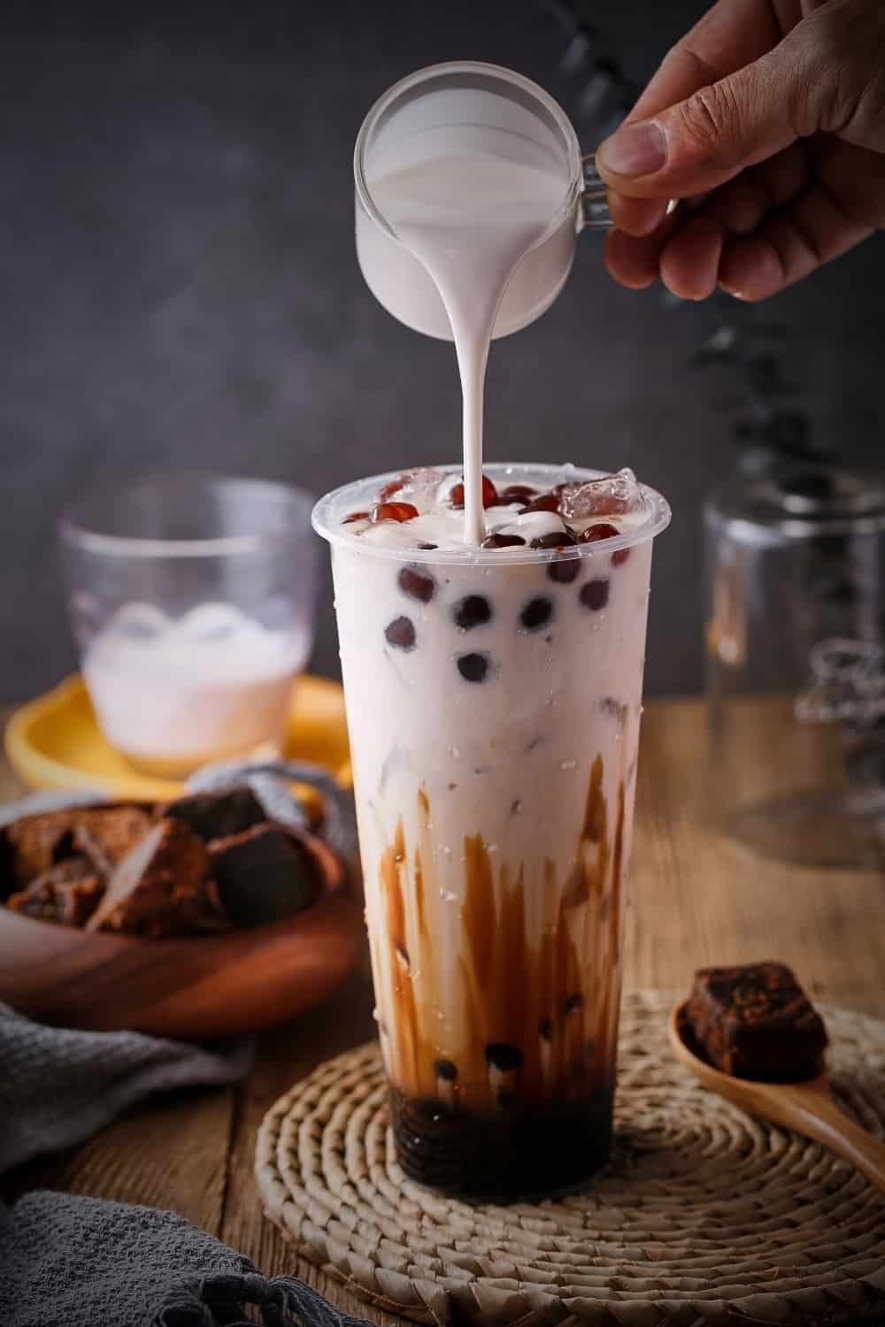 Photographie publicitaire de thé au lait à bulles noires