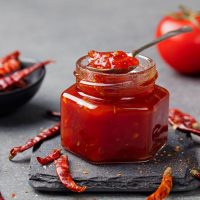 Tomato and chili sauce in a jar