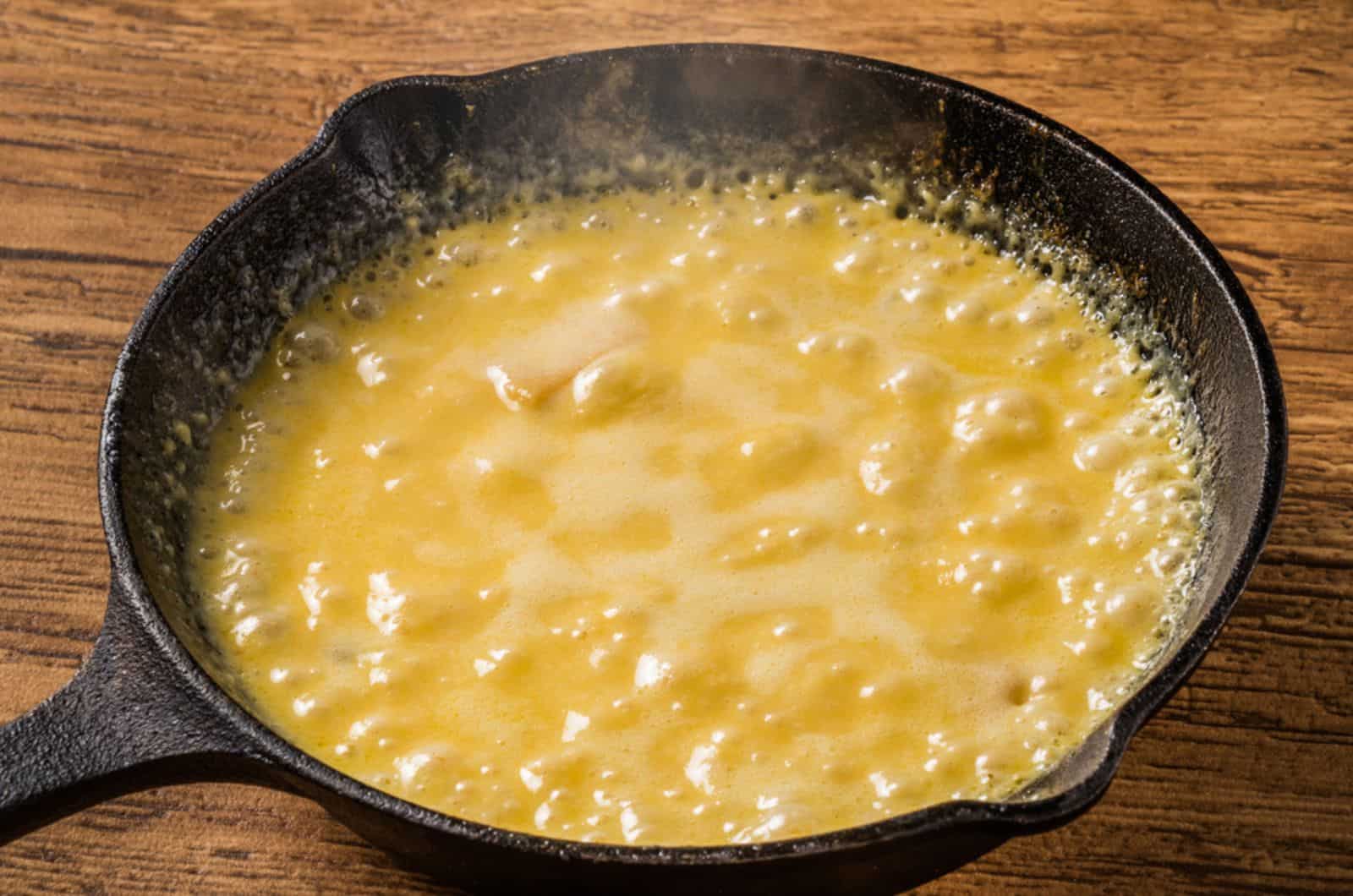 melting cheese in a pan