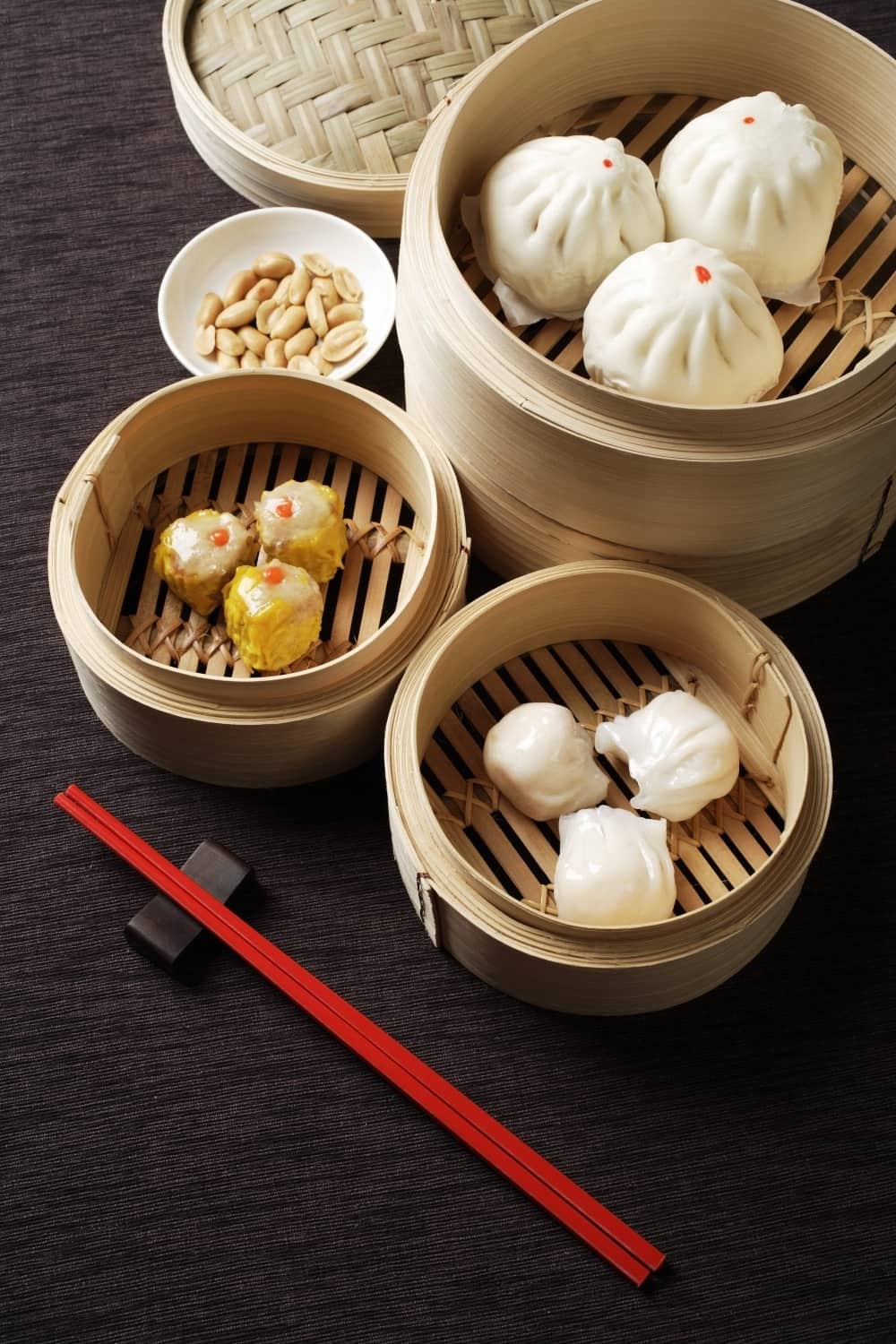 Assortment of dim sum in bamboo steamers.