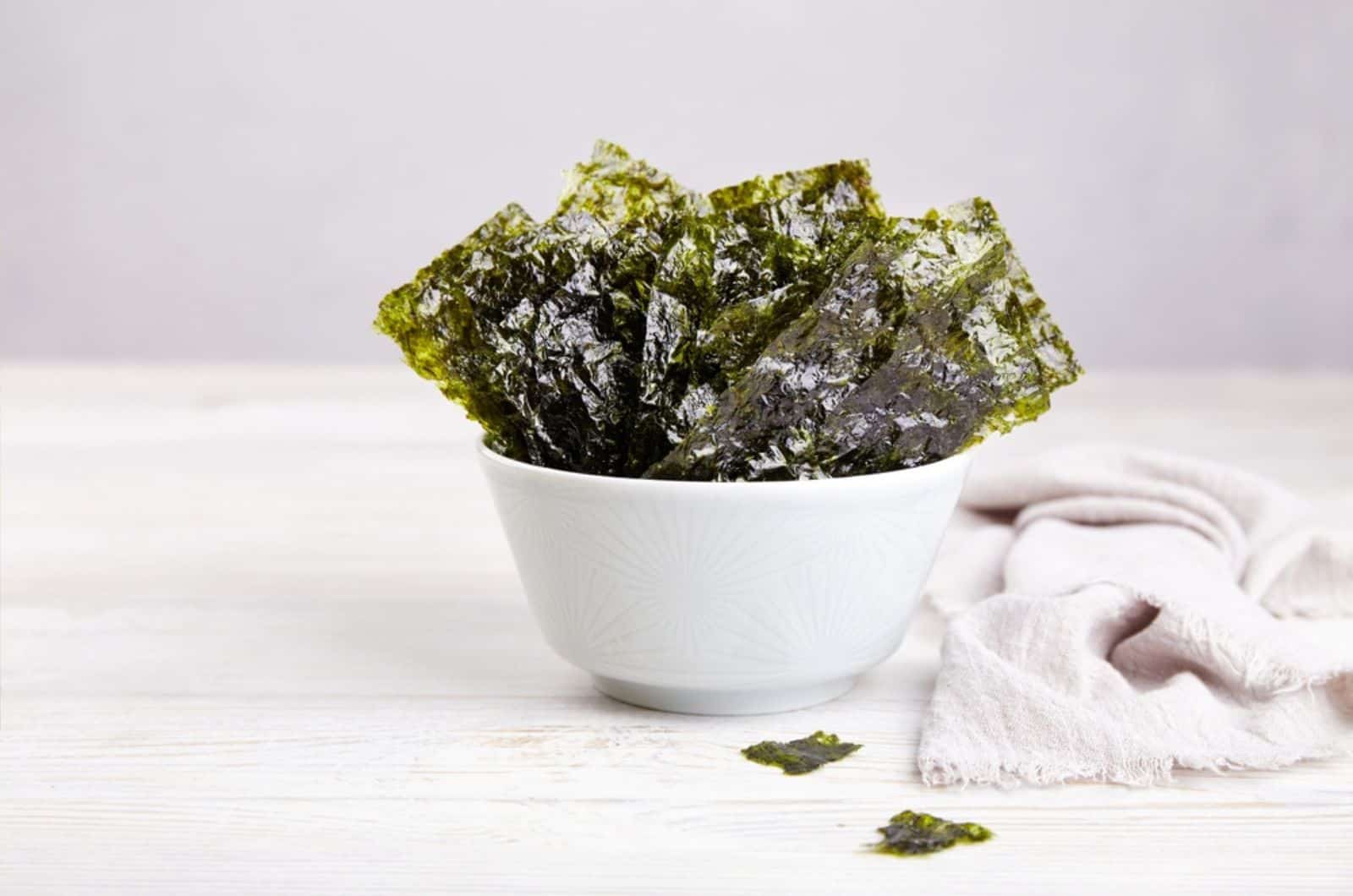 Crispy nori seaweed on bowl 