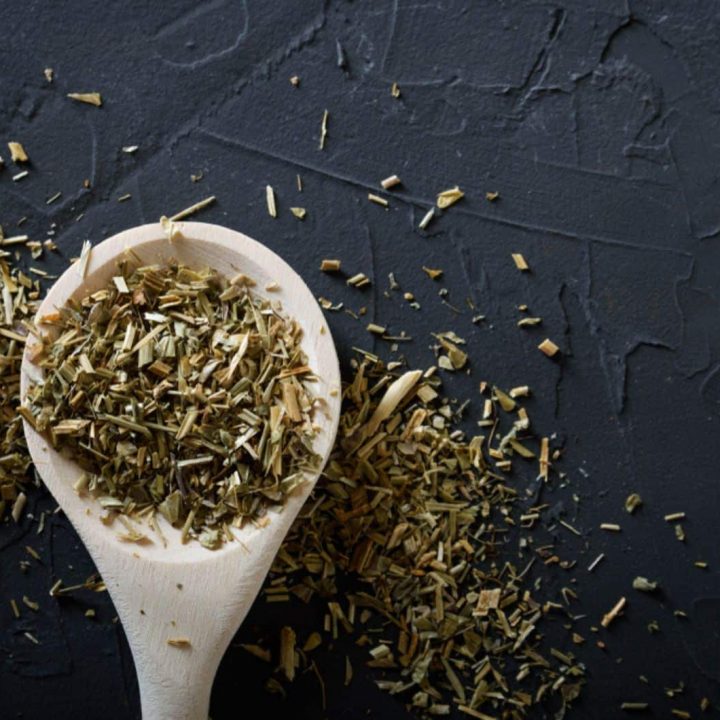 Wooden spoon with Italian seasoning-dried oregano with thyme