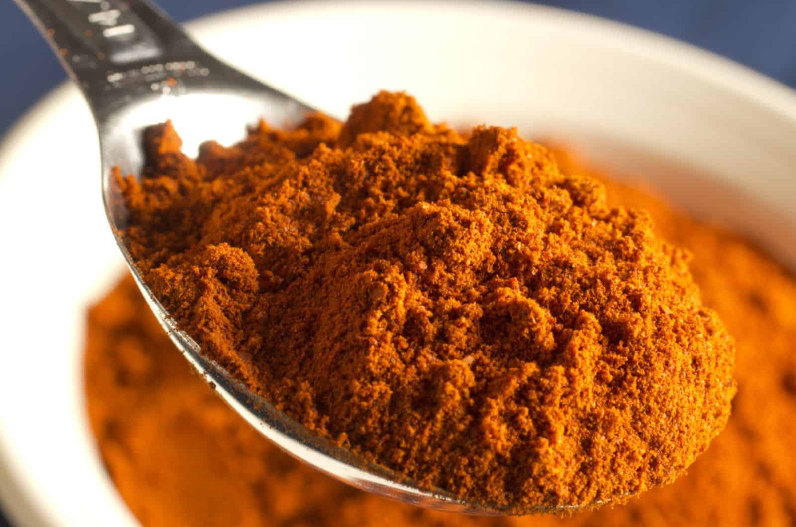 berbere powder in a spoon