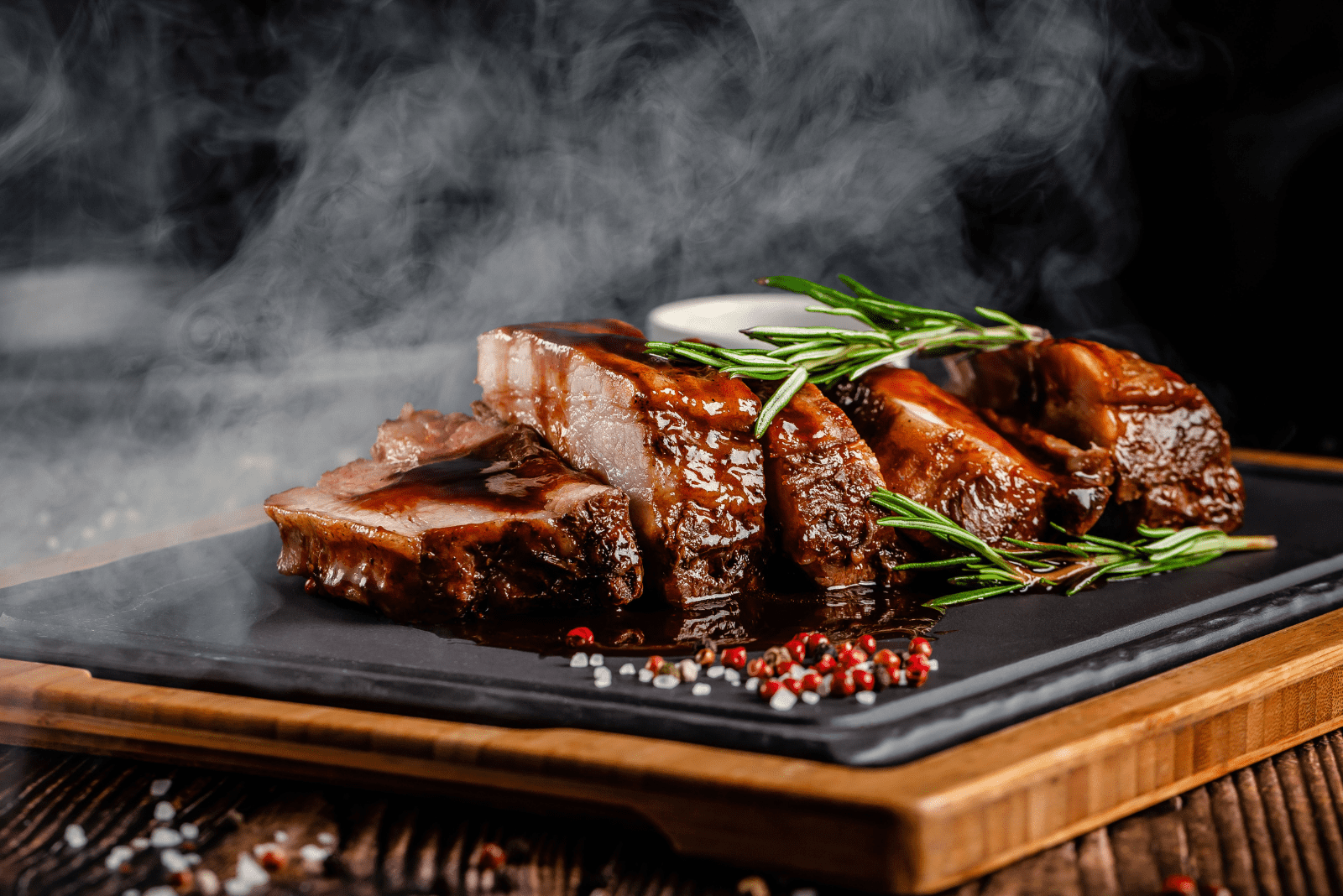 dry smoked ribs on black plate
