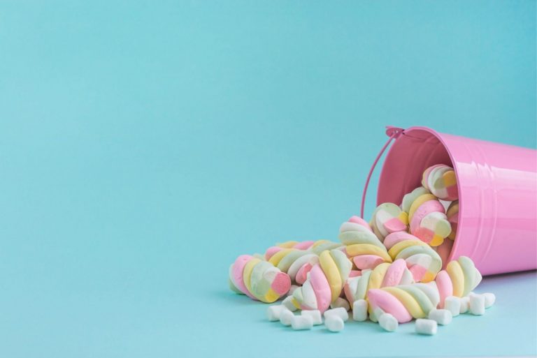 Chewy candy close-up on a turquoise background