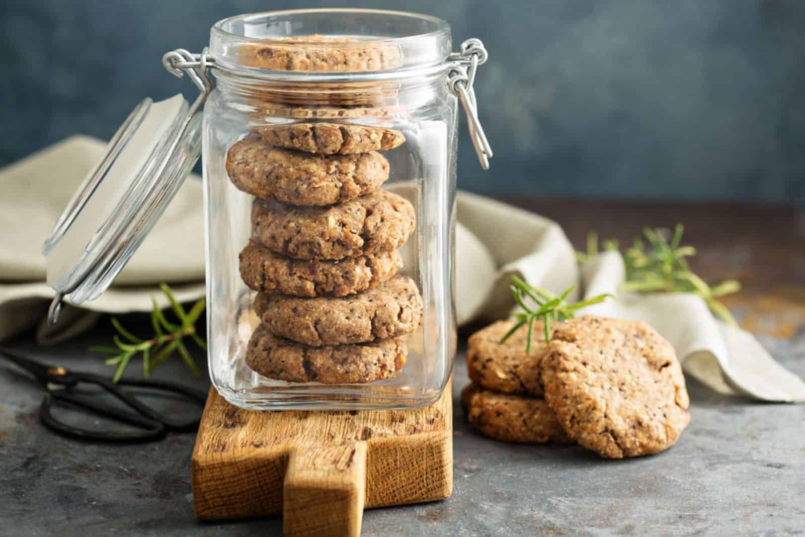 Healthy cookies with dried fruits and nuts in a glass jar