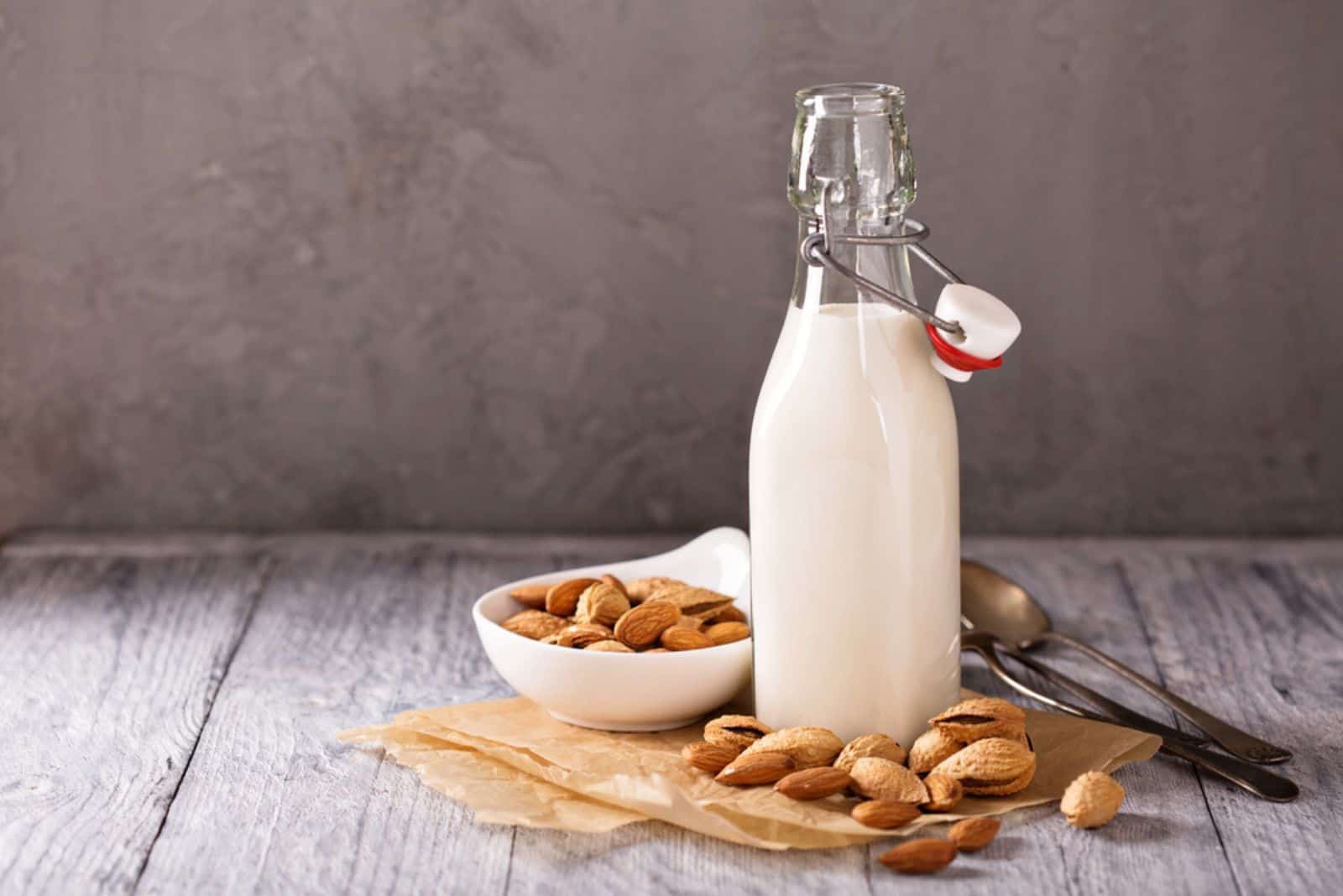 Homemade almond milk in a small bottle