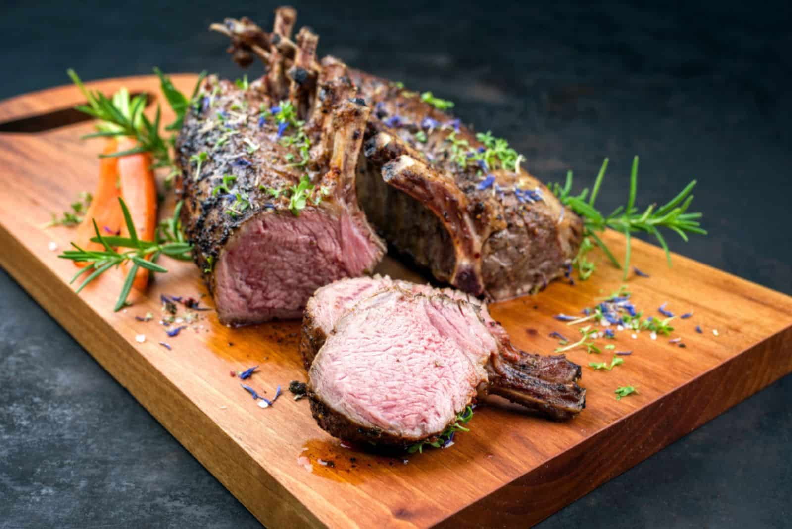 Barbecue rack of lamb with carrot and herbs