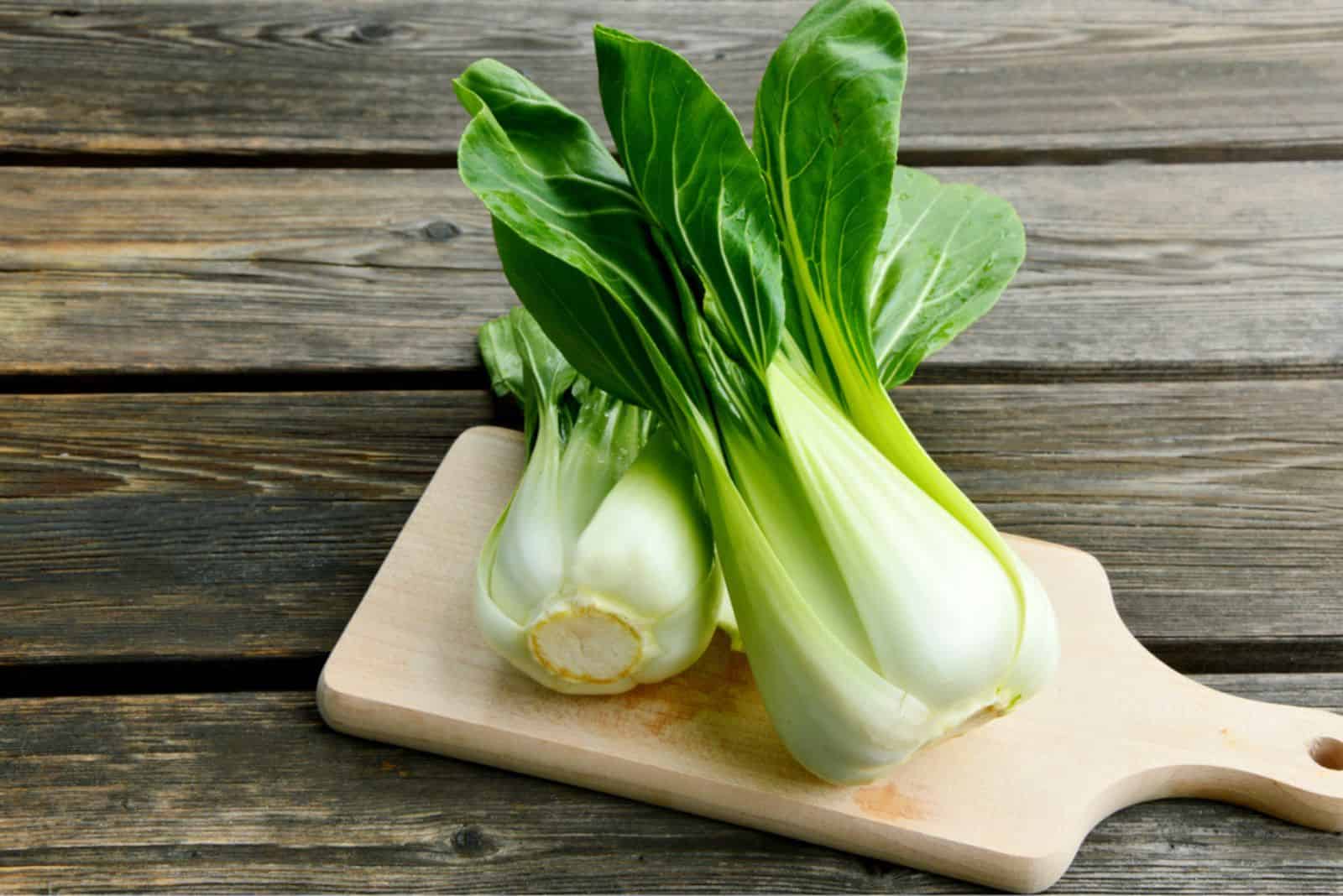 Bok choy or Chinese-cabbage on wooden board