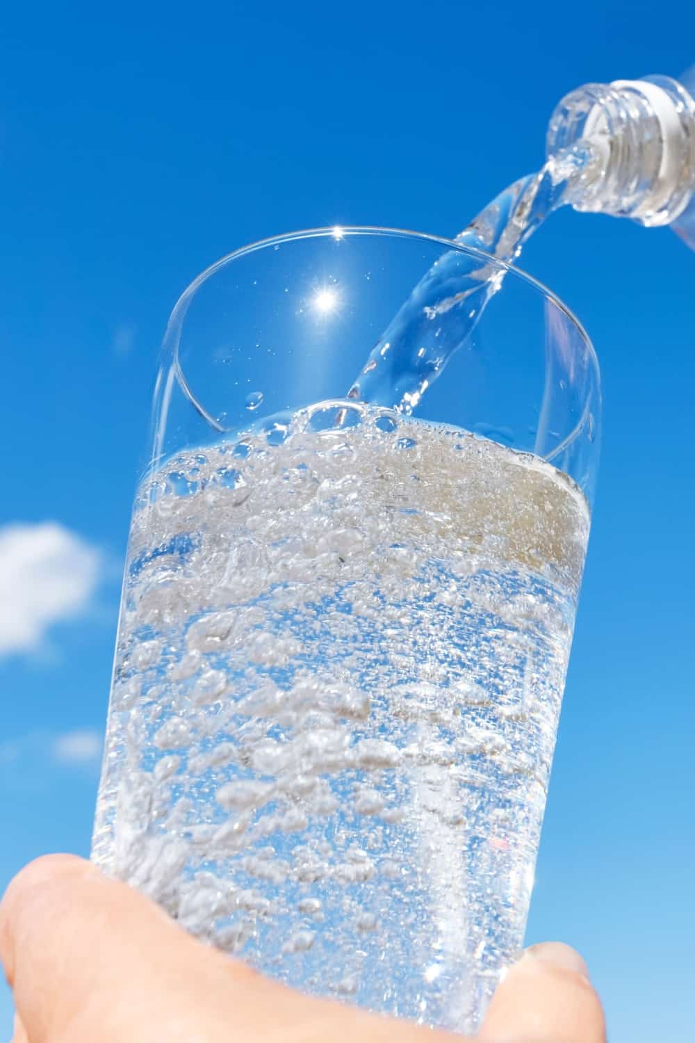 Carbonated water with blue sky