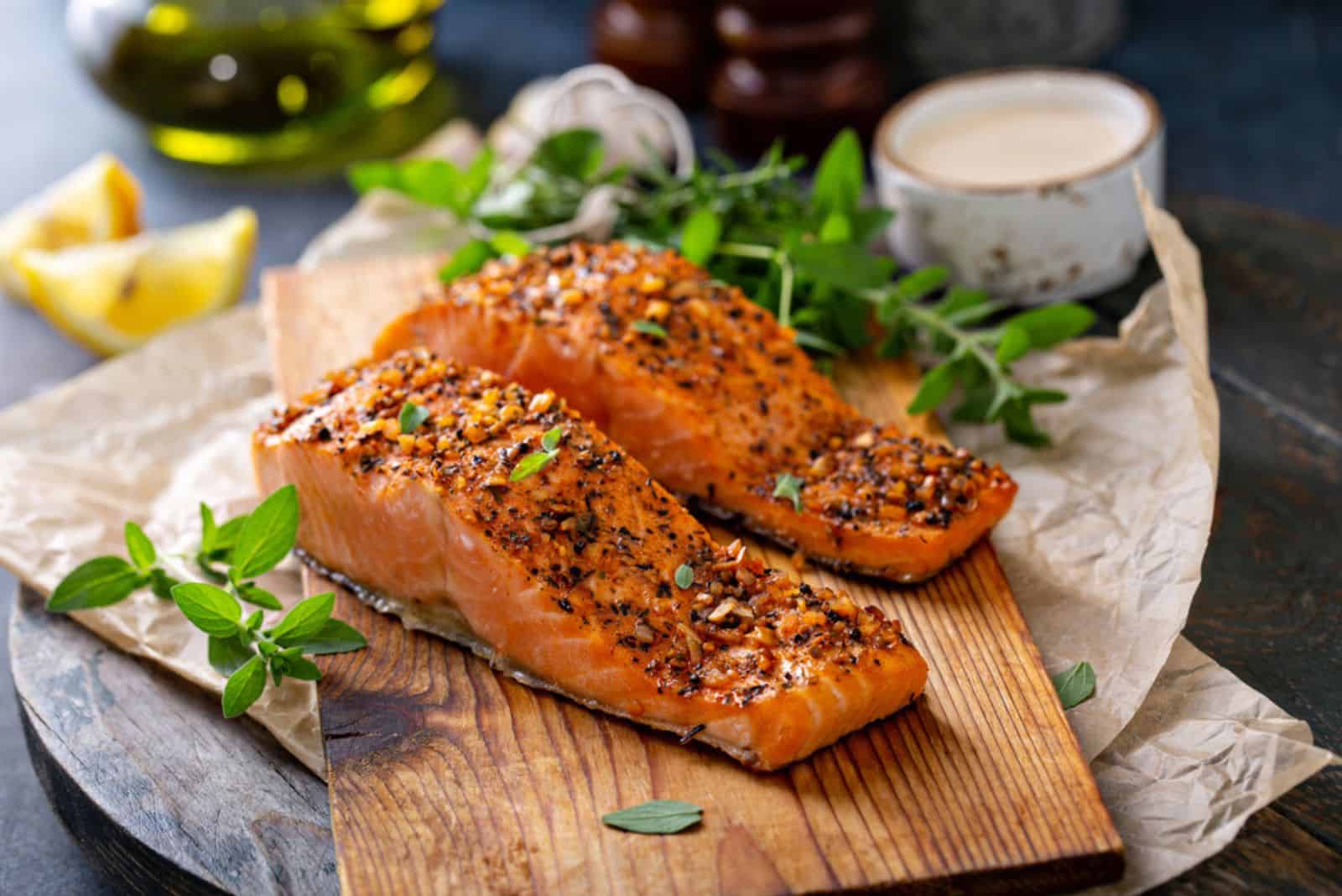 Cedar plank grilled or roasted salmon with herbs, garlic and spices