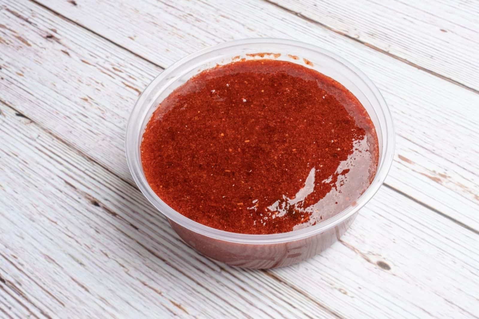Chamoy rimming sauce on white table
