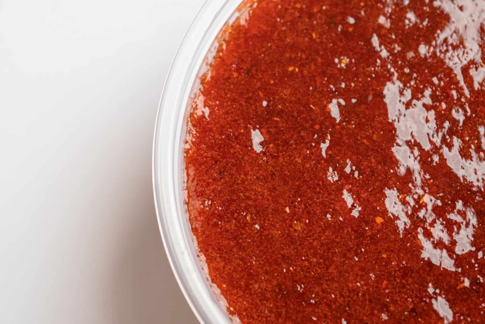 Close up of chamoy rimming sauce
