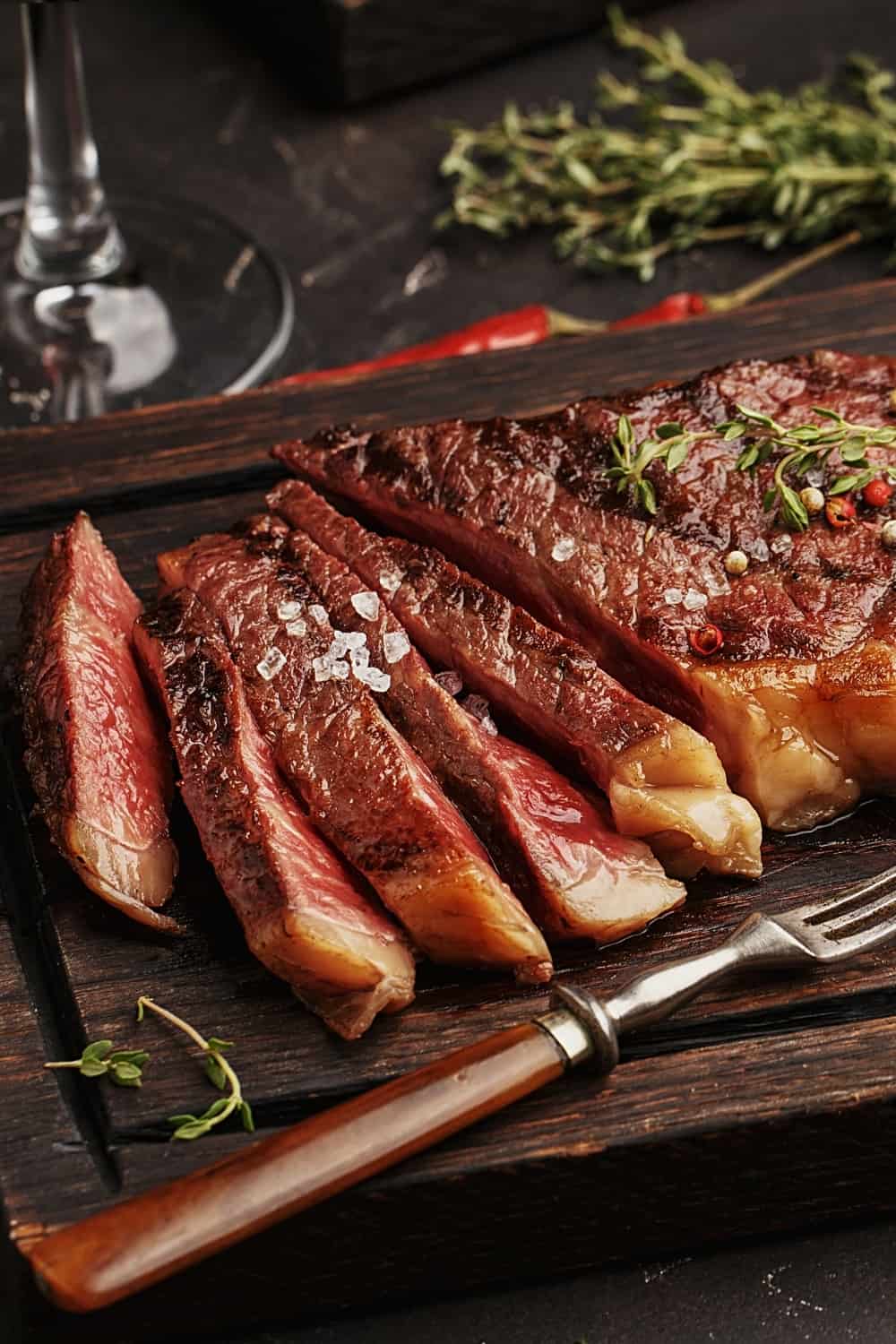 Medium rare sliced grilled striploin beef steak