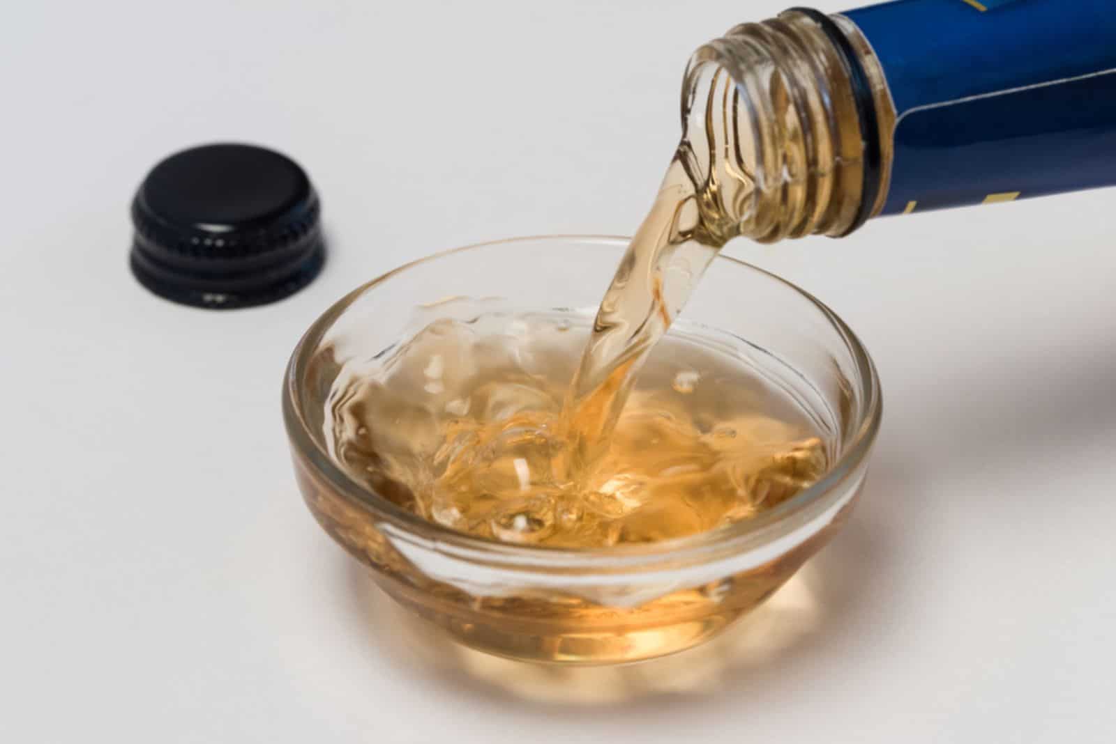 Pouring Cooking Sherry into an Ingredient Bowl