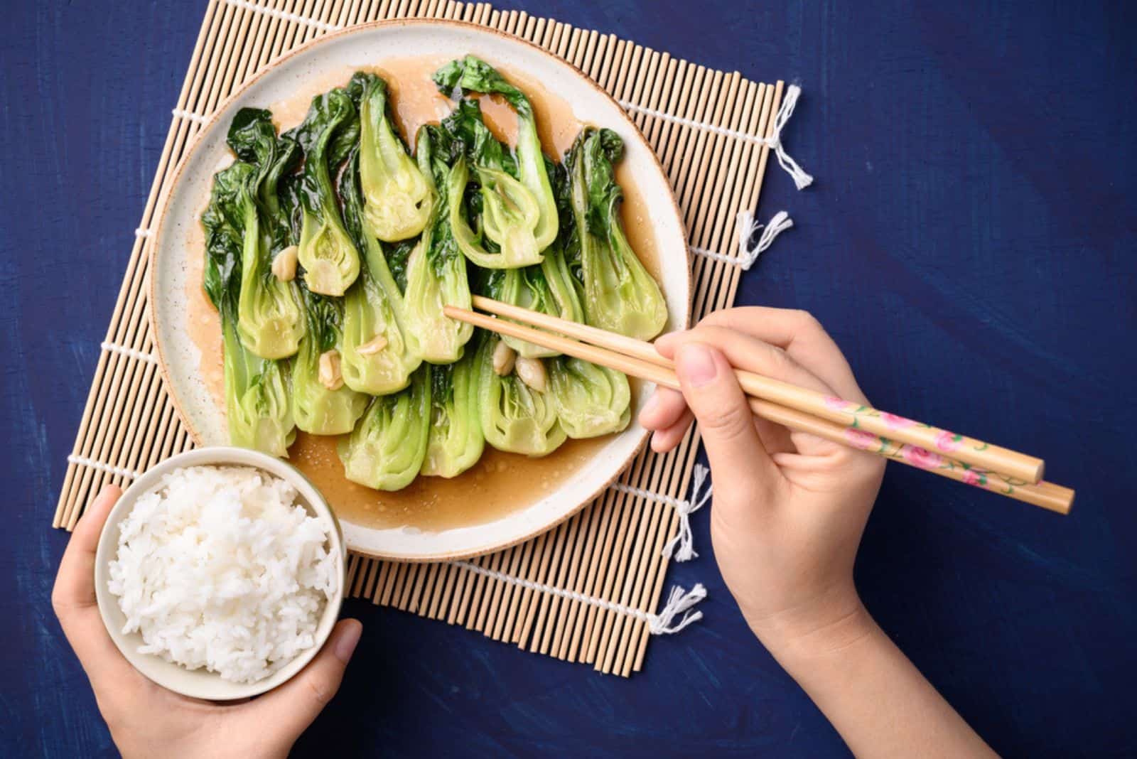 Stir fried bok choy with soy sauce on plate