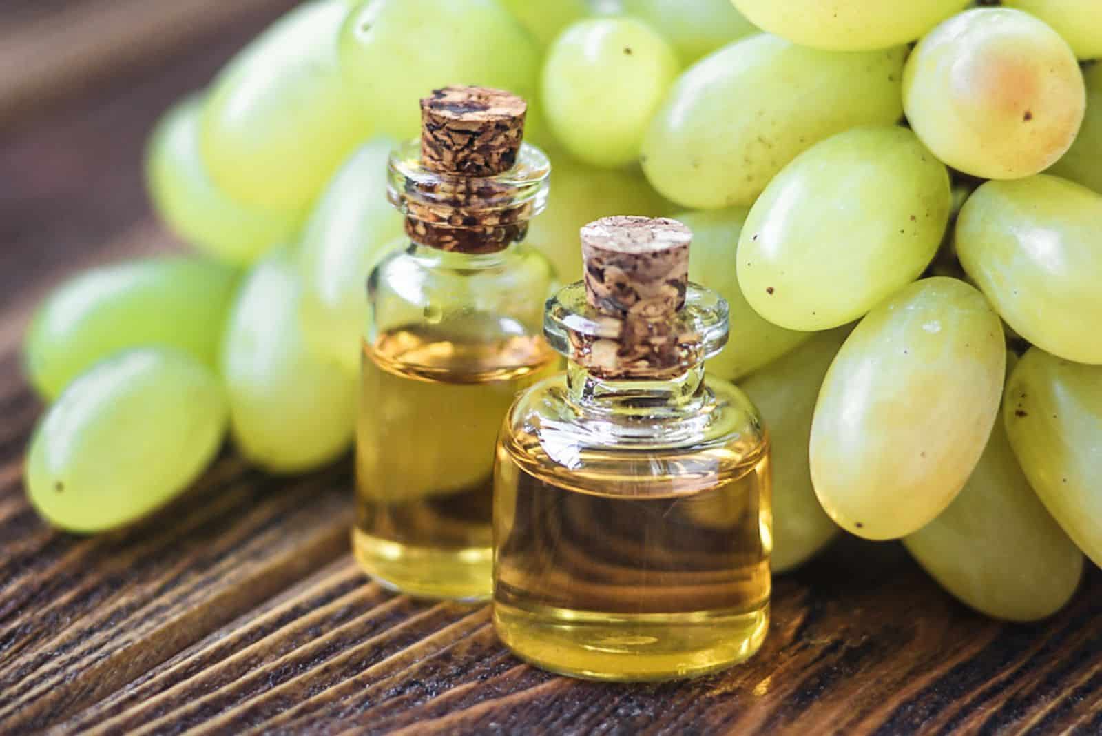 White Wine Vinegar with grapes on the table