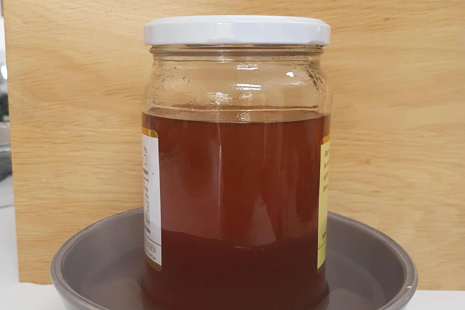 honey in a bowl with water