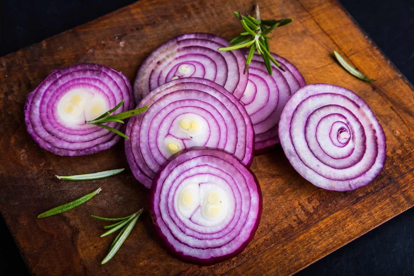 onion cut on a wooden board