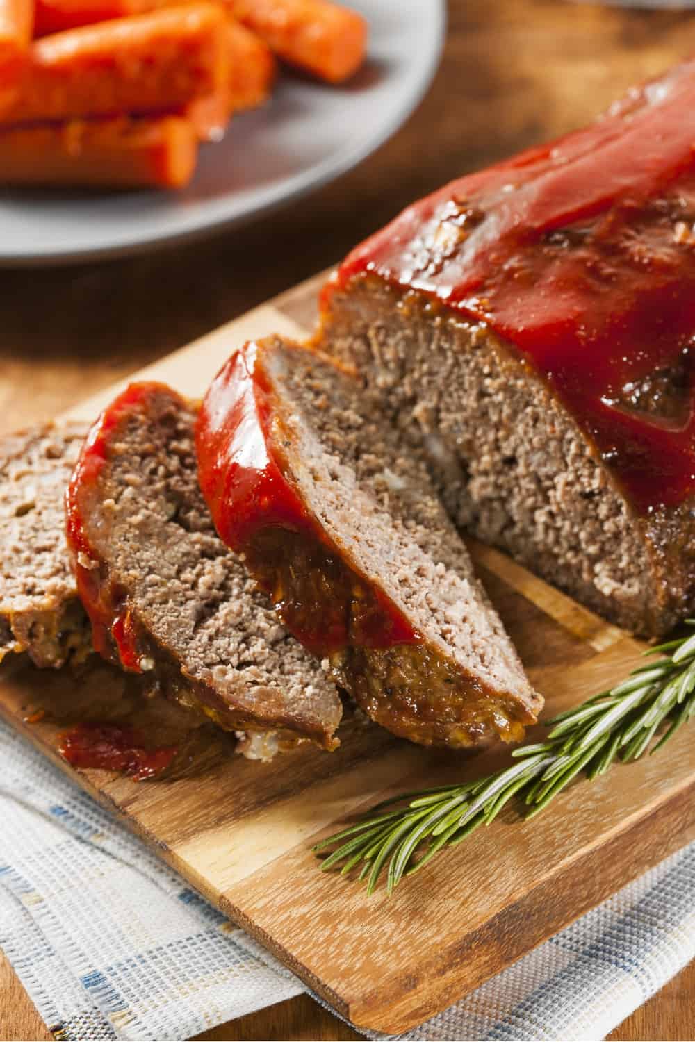 photo of cut up meatloaf on a cutting board
