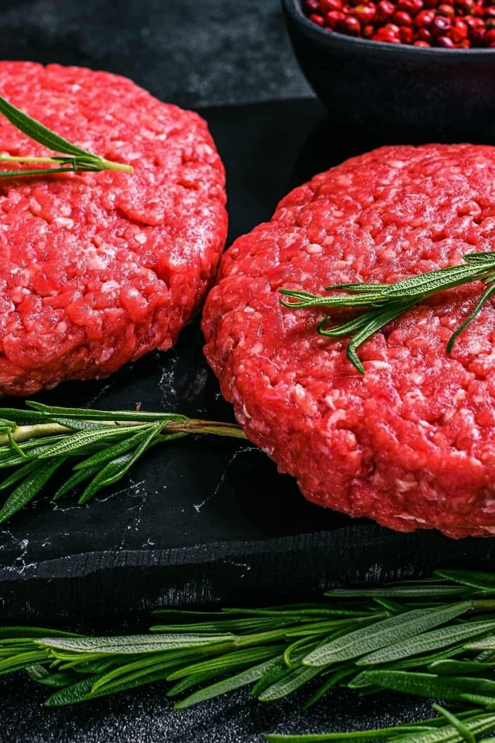 raw Hamburger Patties on table