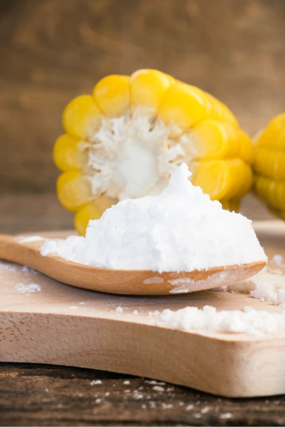 Cornstarch in a spoon with corn