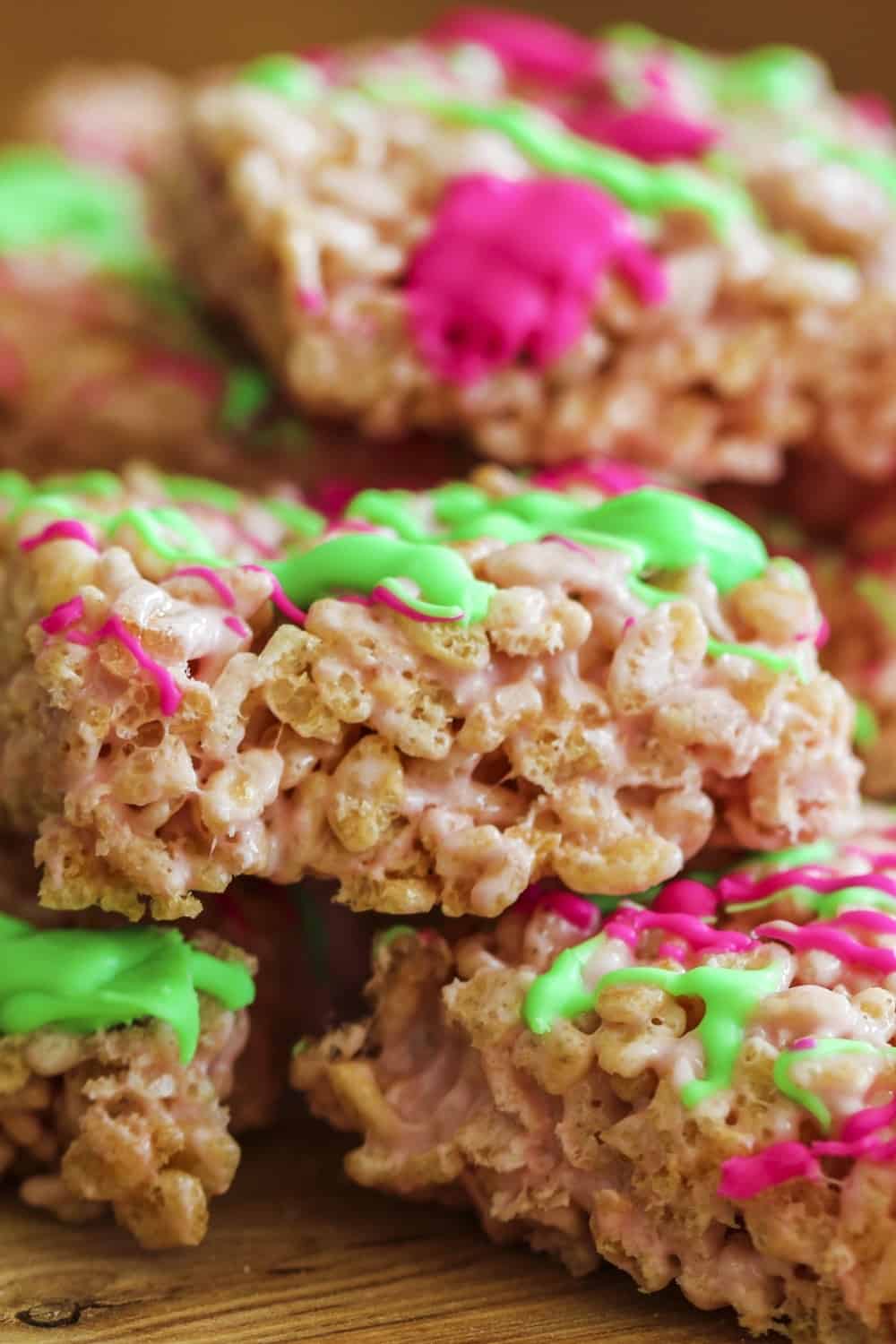 Rice Krispie Treats cooling on a wooden base