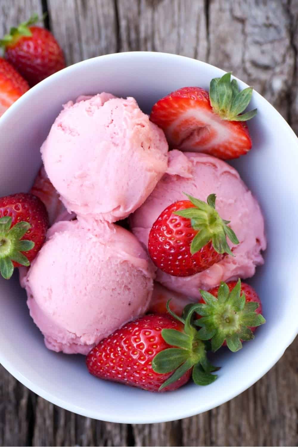 Strawberry ice cream in a white bowl