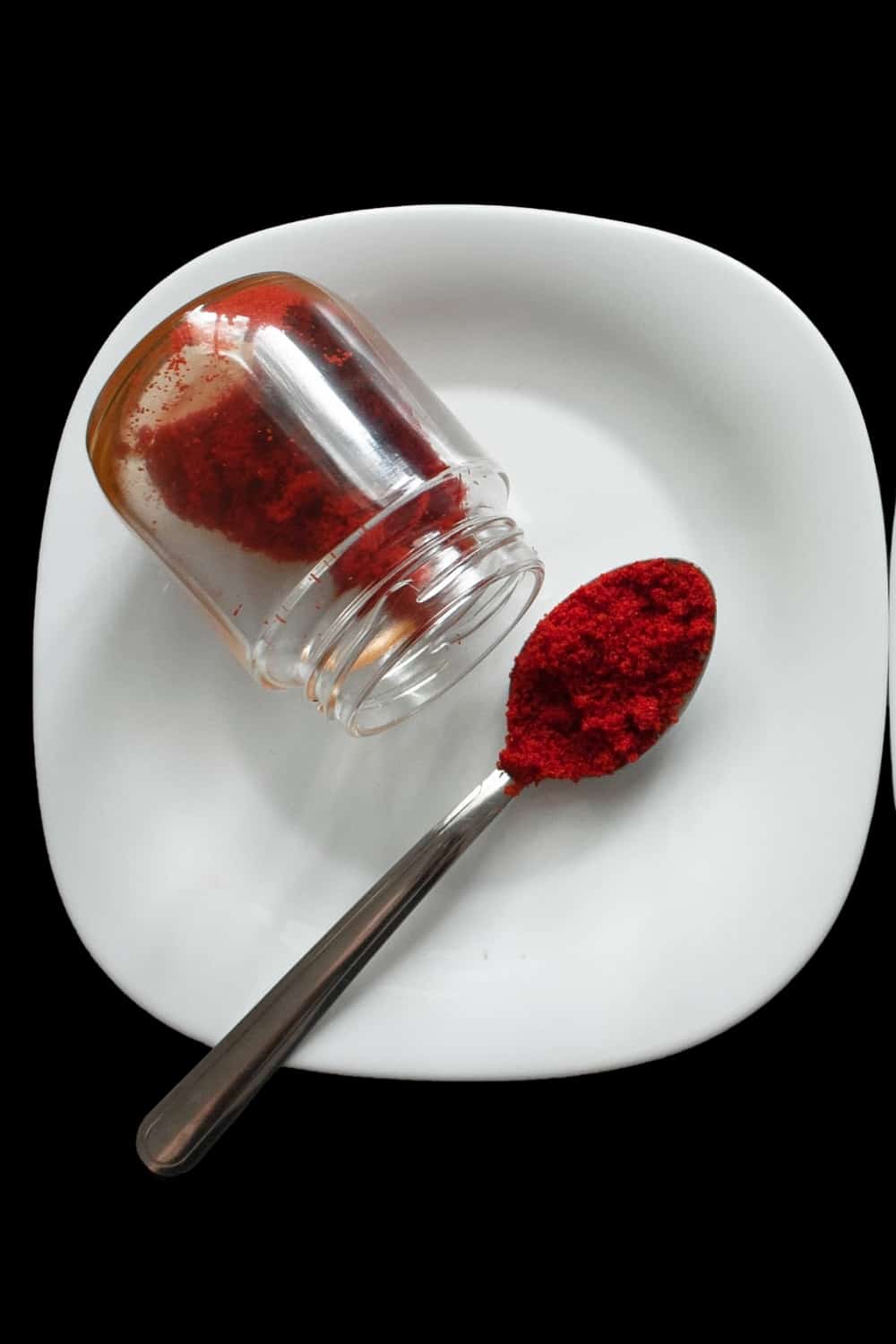 paprika spoon portion of paprika powder