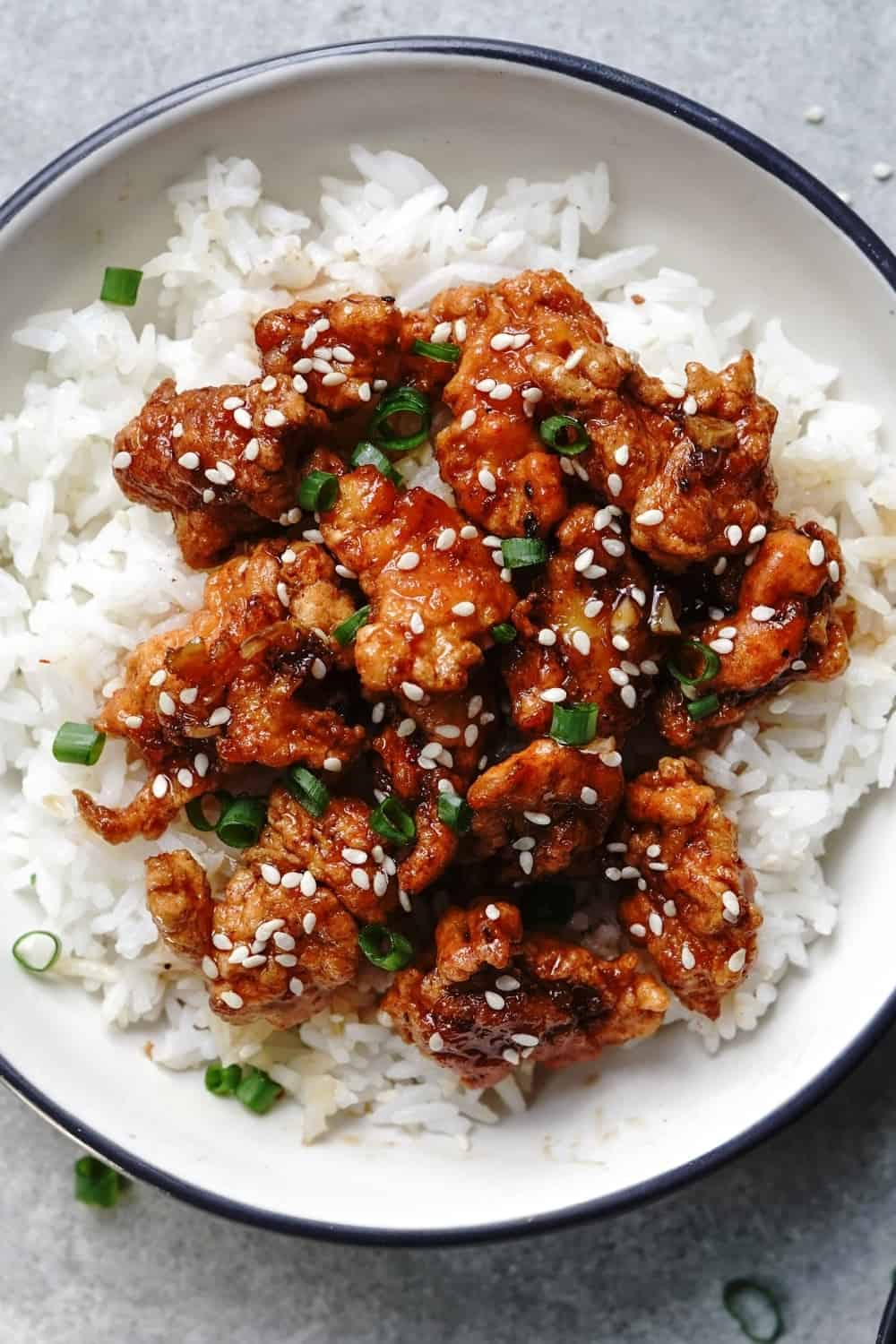 sesame chicken served with rice