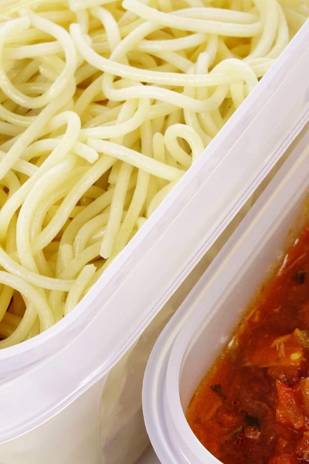 spaghetti and tomato sauce in plastic containers
