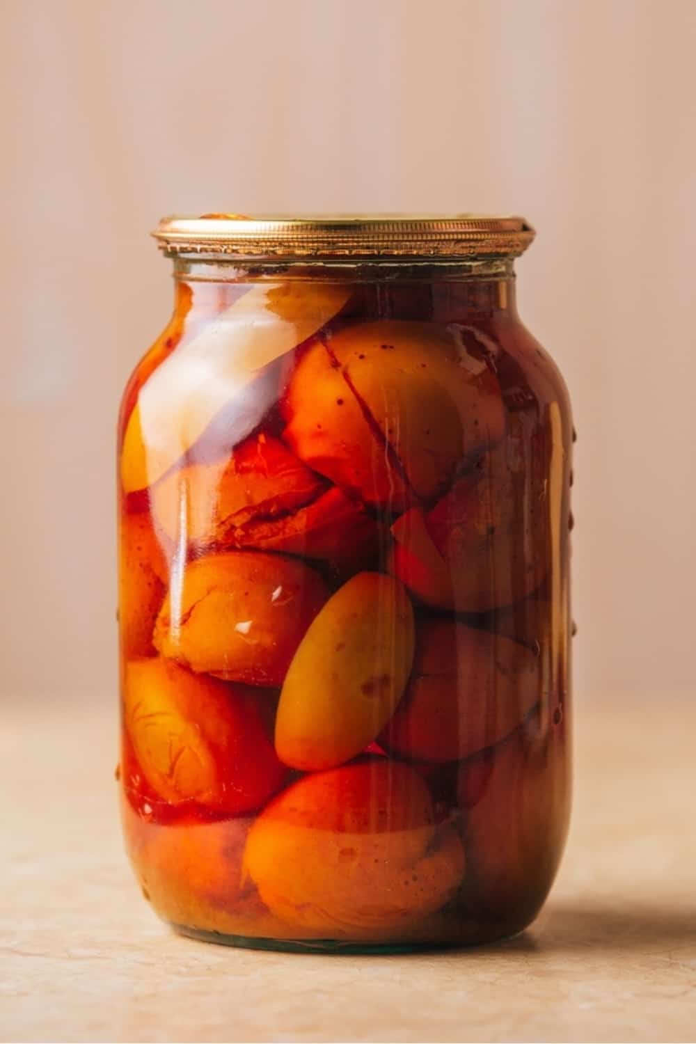 pickled apricots in a jar