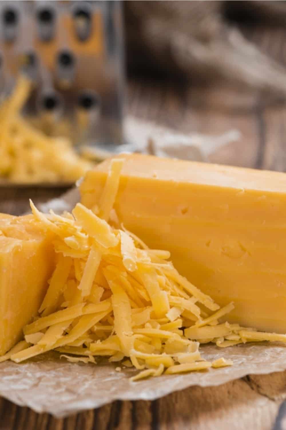 Cheddar Cheese on a wooden table