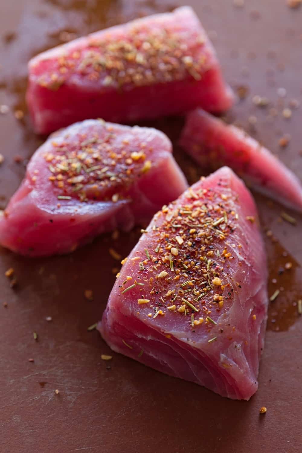 Raw Tuna Fish Steaks on Board