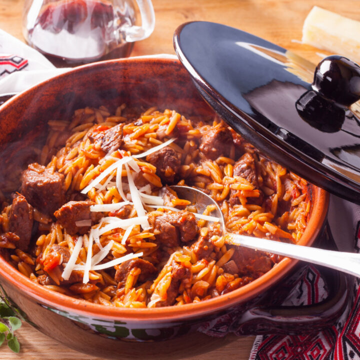 greek recipe with lamb, orzo pasta, grated cheese graviera