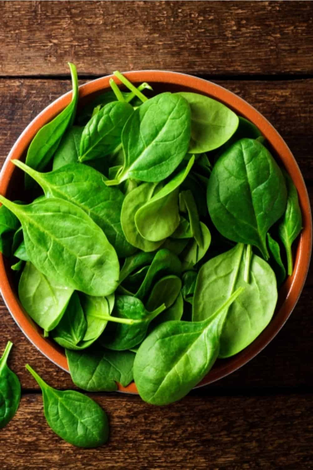 Spinach in a brown bowl