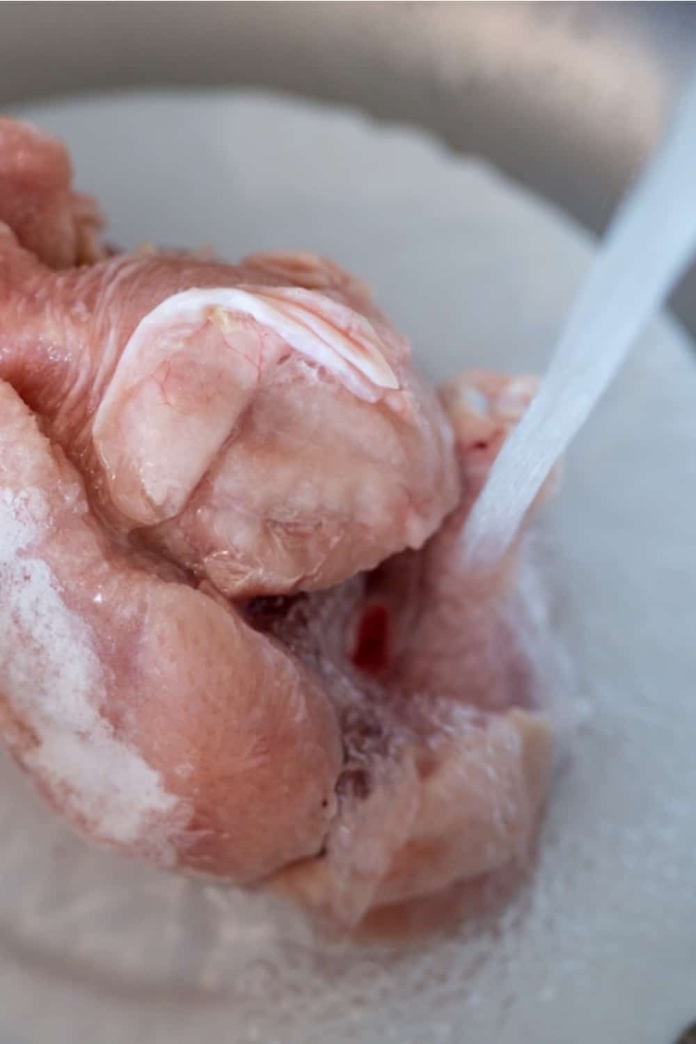 defrosting chicken with water