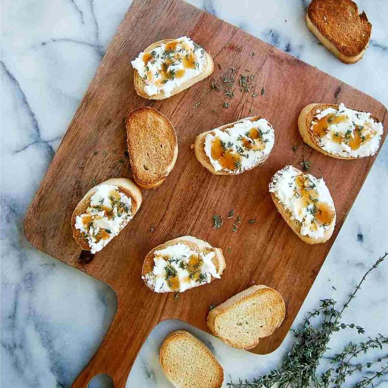 Honey-Drizzled Goat Cheese on Almond Crackers
