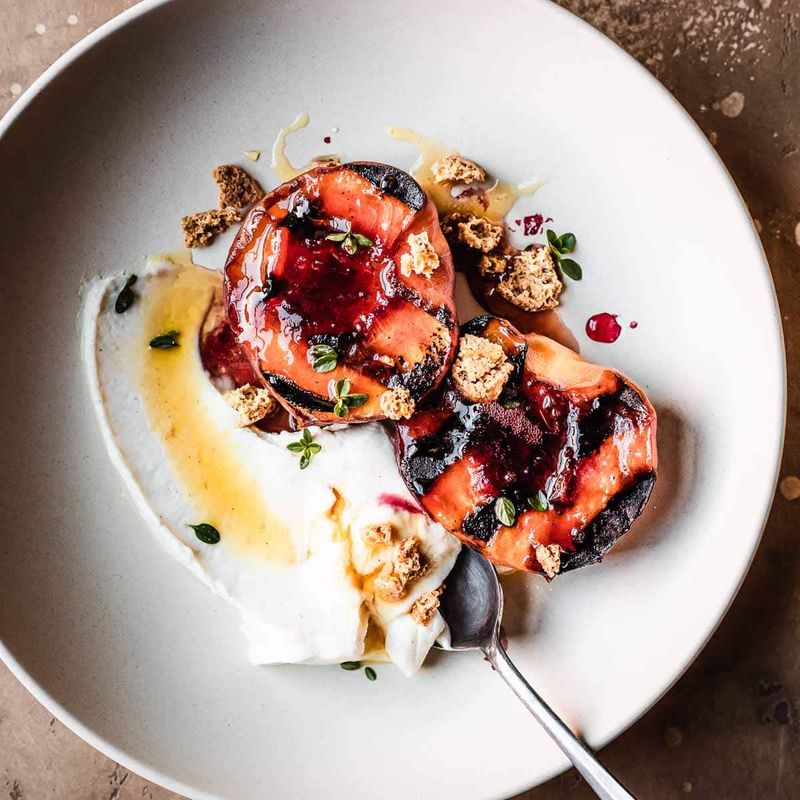 Fire-Grilled Peaches With Vanilla Drizzle