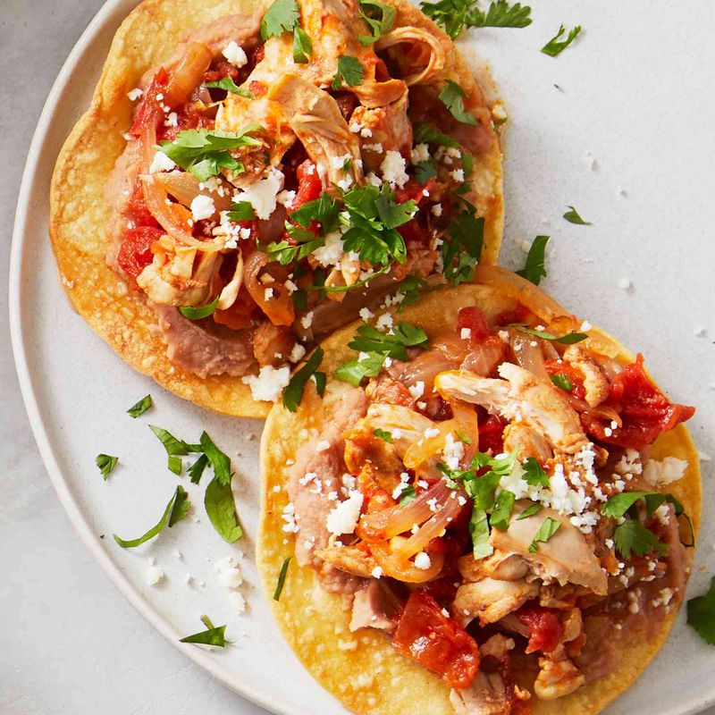 Saucy Chicken Tinga Tostadas