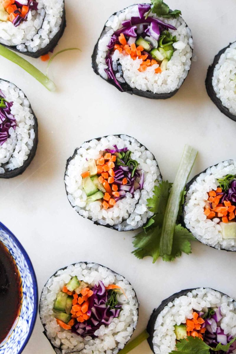 Handmade Sushi Rolls With Fresh Vegetables