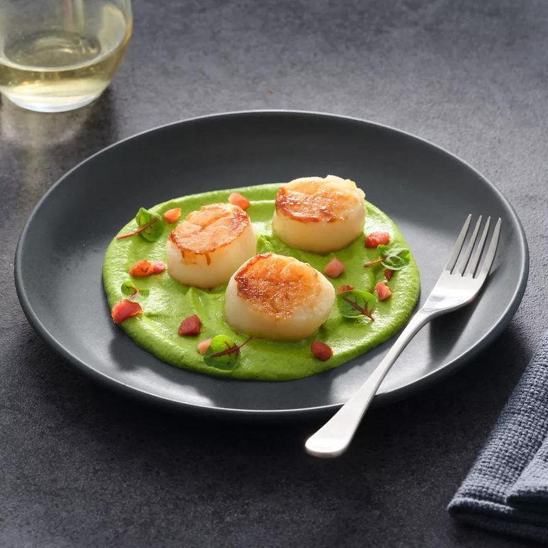 Pan-Seared Scallops Over Pea Purée