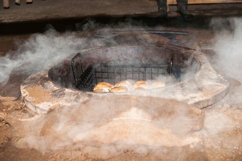 Underground Pit Roasting In New Zealand