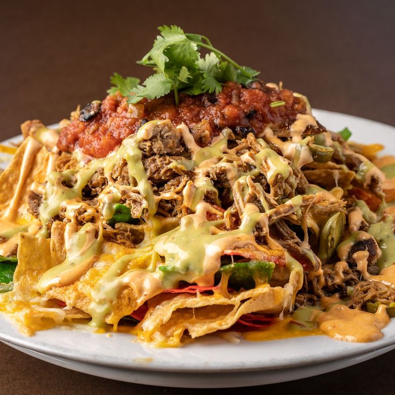 Nachos Supreme - The Cheesy Money Pit