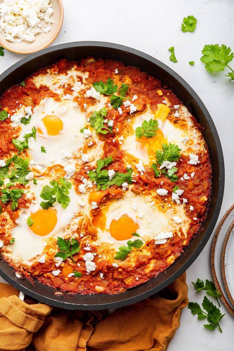 Shakshuka With Poached Eggs In Spiced Tomato Sauce