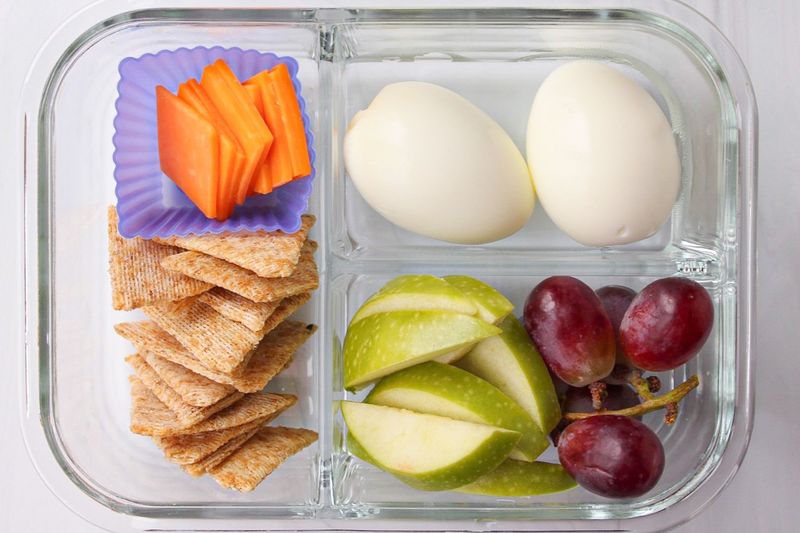 Hard-Boiled Eggs With Crackers And Grapes