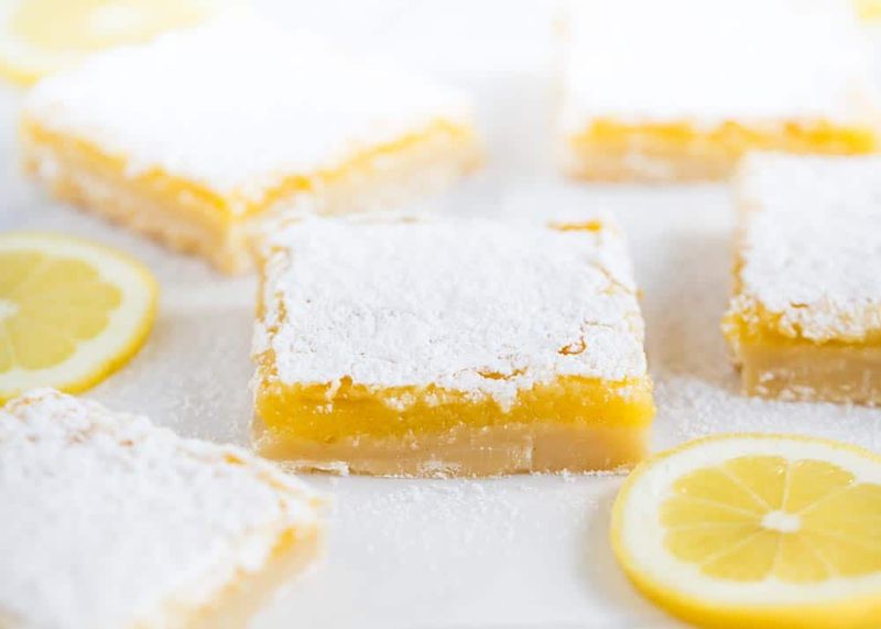 Lemon Bars With Powdered Sugar Caps