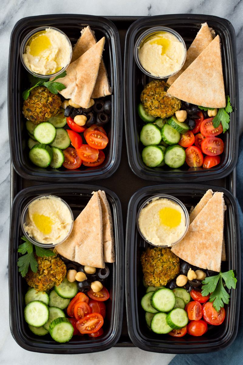 Hummus With Pita Triangles And Cucumber Sticks
