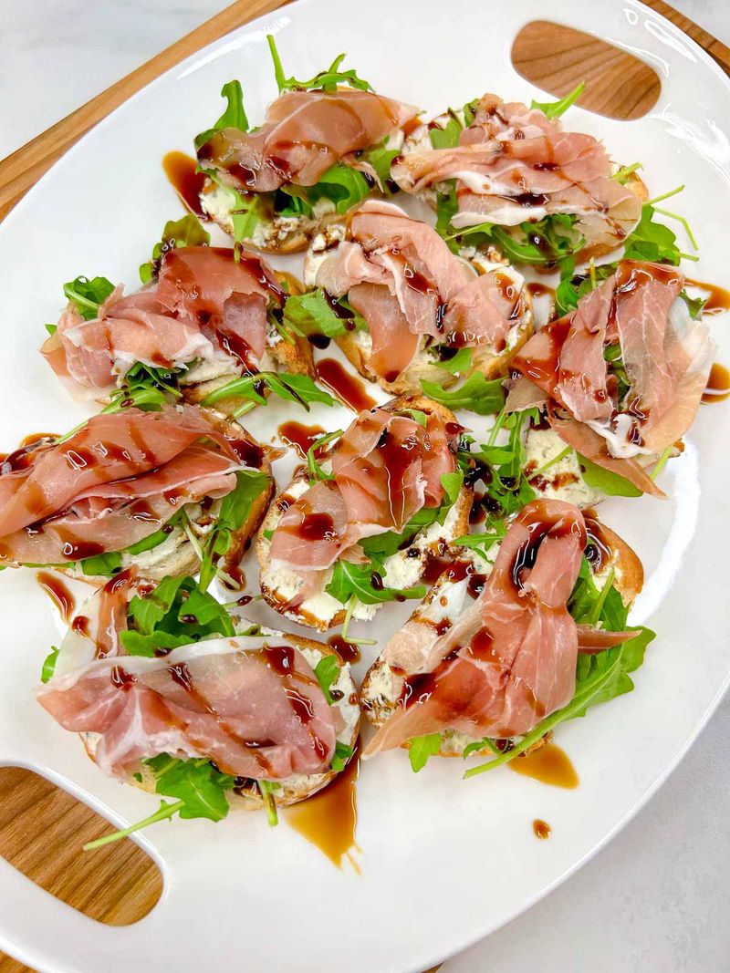 Prosciutto And Arugula Pizza Toasts